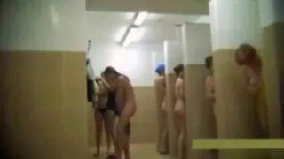 Teens and moms in public shower room