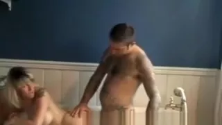 Milf blonde slut satisfies two fat dicks with her mouth