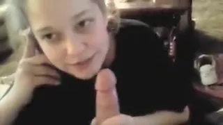 Blonde Talks on the Phone While Sucking Cock