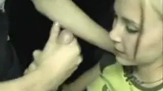 Cute teenage chick giving a superb head in the rest room