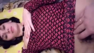 Aroused brunette with pulled up skirt has orgasm while fisted