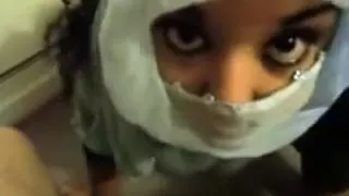 Hijab girl gets a facial