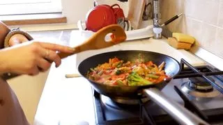 the housewife alone at home prepares a quick dinner naked in the kitchen. compilation