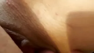 He licks her teen pussy very close, fingering