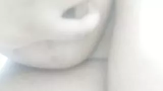 Hot brown girl playing with boobs and sucking nipples