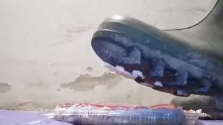 Worker Stomping Cake with Rubber Boots