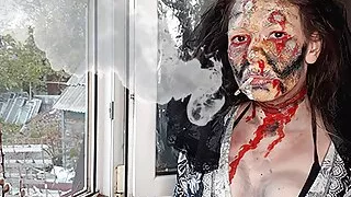 wife smokes cigarette makeup zombie