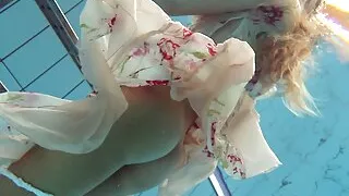 Hot babe Lucy swims nude