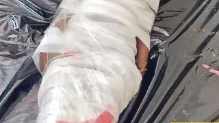 Fejira com Zentai girl mummifies herself with gauze