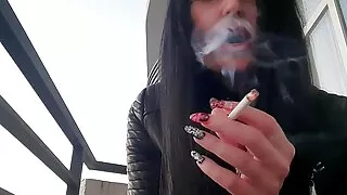 Smoking fetish from sexy Dominatrix Nika. Pretty woman blows cigarette smoke in your face