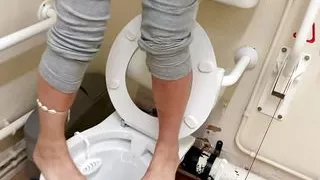 Nemo disgraces me by pissing all over my feet in a public disabled toilet