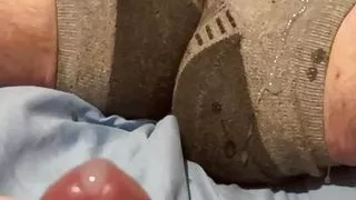 Massive cumshot shooting over socks and shoots multiple ropes flying all over