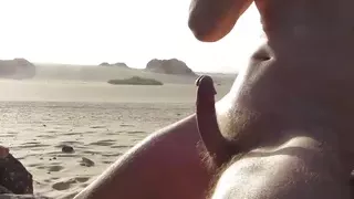 Sensual wank on public beach