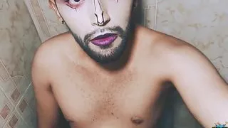 Alien boy jerking his big uncut cock in the shower and eating his own cum