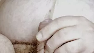 Chubby bear pisses in his moth and swallows