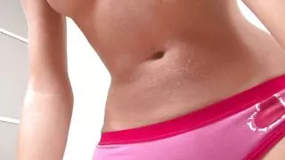 Slutty brunette shows off her perky tits and sexy ass