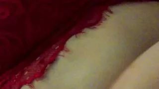 Evening homemade masturbation in beautiful red lingerie with an orgasm. Close-up