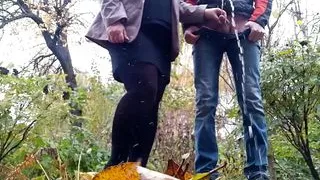 Gorgeous MILF in a skirt loves to hold my cock hard outdoors