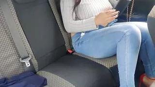 Busy worker in red heels and jeans masturbates her pussy and ass in a car uber