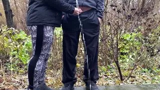 Sports mother-in-law after jogging in the park holds son-in-law's penis