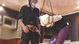 A female slave hung with an anal hook and a crotch rope... sucking a cock... thrusting into a pussy. Continue at the fan