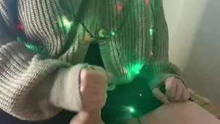 New Year's beauty jerks me off and gets her dose of cum