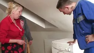 Repairmen banging busty granny from both ends