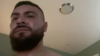 Hairy bearded man having sex