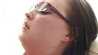 She might look geeky but the brunette with glasses can put