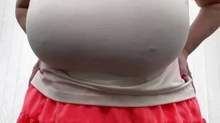 Sally's huge tits get very wet.