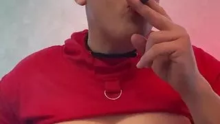 Rouge Domme Smoking In BDSM Gear