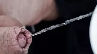 Micropenis smallpenis pissing in the toilet