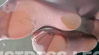 White Stockings Over Flesh-Colored Pantyhose Teasing On Glass Table