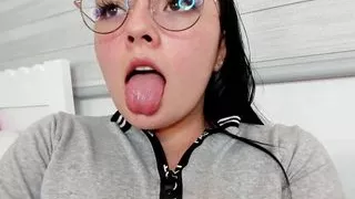 Sexy Colombian Pavlova Colucci with the face of an innocent girl and wearing glasses shows you her wet and slimy pussy,