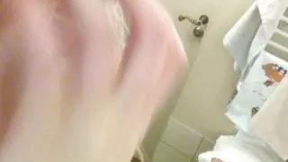 Nude gentle striptease in the bathroom. Close-up