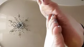 Foot fetish with Christmas mood - on high heels from Mistress Lara in latex