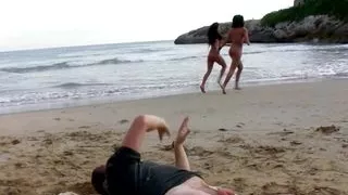 His beach day gets dirty as the brunettes ride his big cock