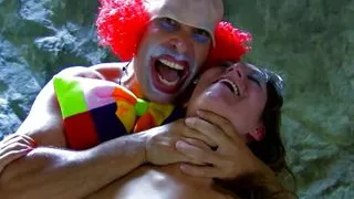 The clown is funny but he knows how to drill the brunettes