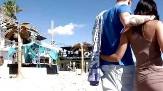 There is no relaxing on the beach when the brunette aches