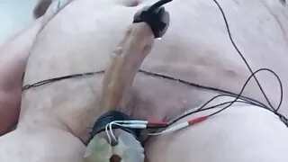 Bound balls & nipple clamps are estimmed, and conductive tubing cinches the end of my dick. HFO