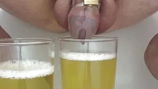 Old Clip from 2017: Pissing in Chastity Cage