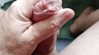 Hot wanking in used condom