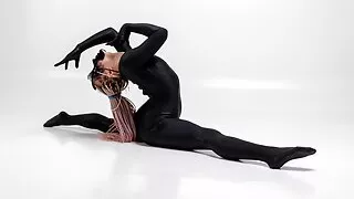 Hot gymnast with braids Lola Kauchuk dressed in latex