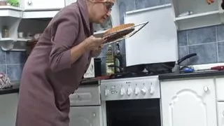 In the kitchen with the old slut!
