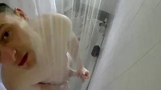 Kudoslong is naked in the shower from above he washes and starts wanking his penis becomes erect as he masturbates