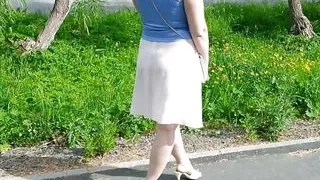 Sexy lady in light dress no bra