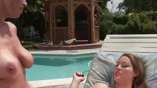 Sexy girls Jassie and Kylie G Worthy in wild lesbian action by the pool.