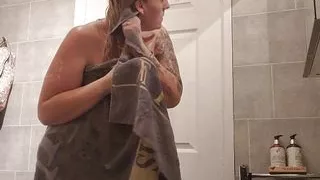 Hot Mom film's Herself getting out of the bath and getting ready