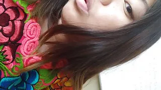 Young teen films herself in the shower while masturbating