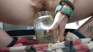 Pissing in a dirty glass in the kitchen after getting caught short whilst sorting the sidekicks dinner